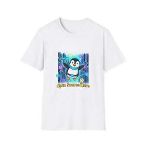 May include: White t-shirt with a cartoon penguin wearing a blue scarf and the words "Open Source Hero." The penguin is set against a background of neon-coloured geometric shapes. The design is centered on the shirt.