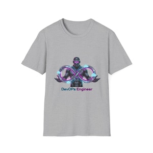 May include: A grey t-shirt with a graphic of a futuristic figure wearing a purple helmet and a DevOps symbol. The text "DevOps Engineer" is printed below the graphic in purple.