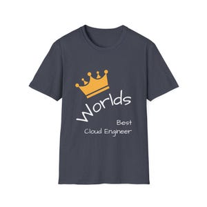 May include: Dark grey t-shirt featuring a gold crown graphic and the white text "Worlds Best Cloud Engineer". The t-shirt has a crew neck and is likely made from a soft fabric.