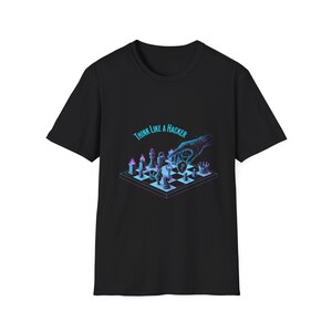 May include: Black t-shirt with a graphic of a chessboard and the text "Think Like a Hacker." The chess pieces are stylized with a blue and purple gradient, and a hand hovers over the board. The design has a tech or gaming theme.