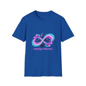 May include: Royal blue t-shirt featuring a graphic of a figure within an infinity symbol, with pink, blue, and teal accents. The text "DevOps Warrior" is below the graphic. The t-shirt is made of a soft material.