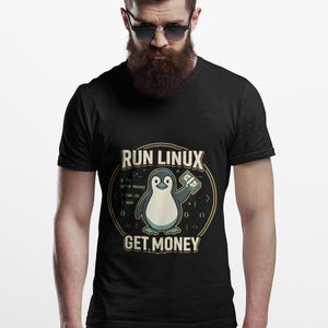 May include: A black V-neck t-shirt featuring a graphic of a penguin holding a stack of cash. The text reads RUN LINUX GET MONEY, surrounded by a circular border with code snippets including grep money, run.sh, and awk, set against a light background.