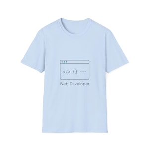 May include: A pale blue t-shirt with a web developer design. The graphic shows code symbols and the text "Web Developer". The t-shirt has a crew neck and short sleeves.