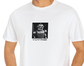 May include: White t-shirt with a black and white image of a vintage robot and the word "VINTAGE" printed on the front.