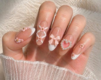 Uñas postizas Pink Coquette con punta francesa almendrada: Lazo 3D, corazón de perlas, set hecho a mano