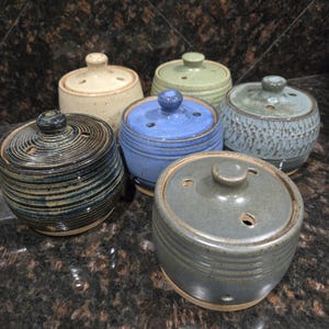 Handmade ceramic garlic keeper.