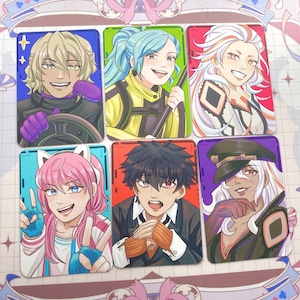 May include: Six rectangular anime-style character cards. Each card features a different character with unique hairstyles and outfits. The characters have various skin tones and expressions. The cards are set against colorful backgrounds, including blue, green, and red.