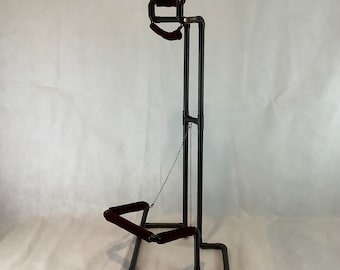 Black copper guitar stand with burgundy velvet