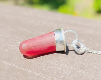 Truly unique!  RED art glass &quot;tusk&quot; found on the beaches of Spain.  Handmade Fine Silver bail, ready to give as a gift or wear yourself!