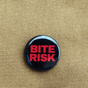 May include: A set of three ceramic mugs with a speckled, matte finish. The mugs are in shades of cream, light gray, and dark gray. Each mug has a simple, modern design and a rounded handle.