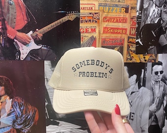 Somebody’s Problem trucker hat