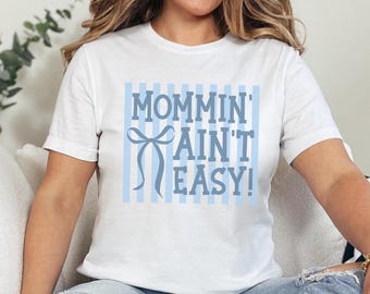 Mommin Ain't Easy Shirt | Funny Mom Life Tee with Bow Graphic