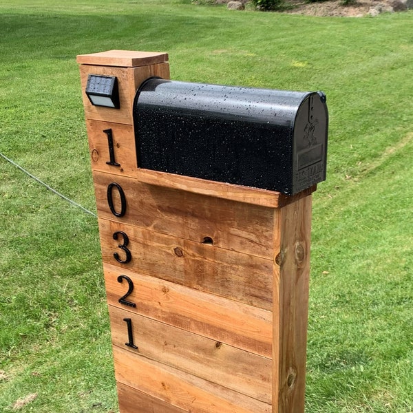 Beautiful, handcrafted cedar mailbox post; A sure fire way to bring that rustic look to the front of your home!