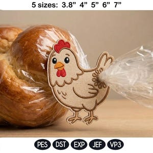 May include: A tan chicken-shaped embroidery design with a red comb and wattle, holding a clear plastic bag. The text "5 sizes: 3.8" 4" 5" 6" 7"" is at the top. The bottom of the image shows embroidery file formats: PES, DST, EXP, JEF, and VP3.