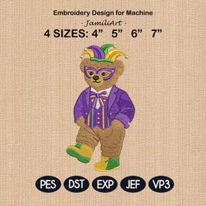 May include: An embroidery design for machine featuring a brown teddy bear wearing a purple suit, a bow tie, and a jester hat. The bear also wears a gold mask. The design is available in 4 sizes: 4", 5", 6", and 7".