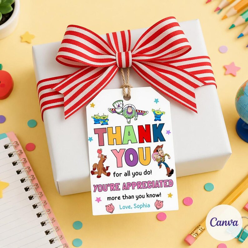 May include: A white gift box with a red and white striped bow. A gift tag with the text "THANK YOU" and Toy Story characters is attached. The tag also includes the phrases "for all you do!" and "YOU'RE APPRECIATED".