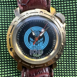 986 WATCH- VOSTOK-WOSTOK- 2409- Russian - - AMFIBIa KOMANDIRSKIe college Karl Liebknecht Plant
