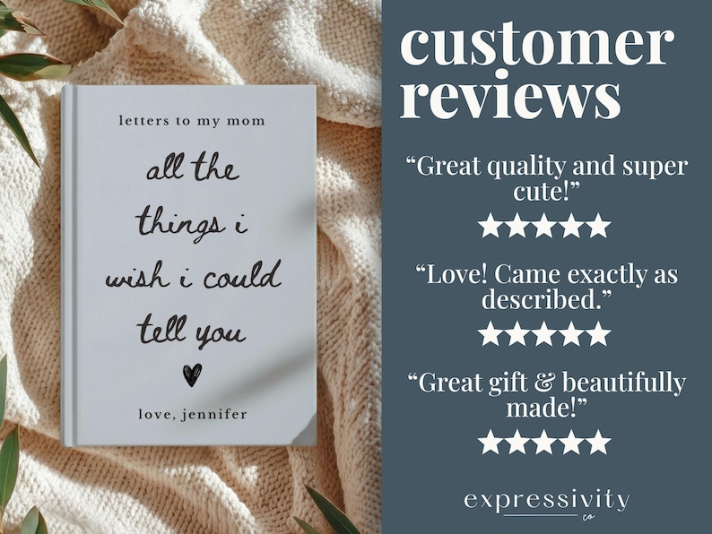 May include: A white book titled "letters to my mom" with the text "all the things I wish I could tell you" in a handwritten style. The book has a black heart and the name "love, jennifer" at the bottom. The book is on a cream-colored blanket.