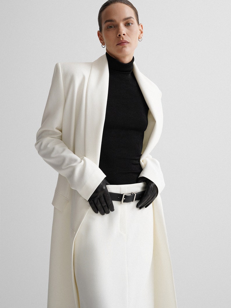"Double-Breasted Shawl Collar"
Luxury Tailoring in Crisp White
