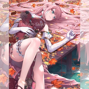May include: A pink-haired anime character with blue eyes is lying on a bed of autumn leaves. She is wearing a red and white dress with a heart-shaped pillow. The text "SENPAI-SAMA" is visible on the pillow.
