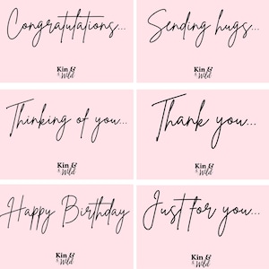 May include: A set of six rectangular greeting cards with a light pink background. Each card features black cursive text reading Congratulations, Sending hugs, Thinking of you, Thank you, Happy Birthday, and Just for you, with the Kin & Wild logo below.