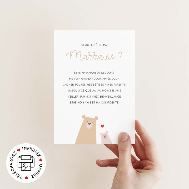 May include: A printable card with a light brown background and a light brown border. The card features two cartoon bears, one larger than the other. The larger bear is on the left and the smaller bear is on the right. The larger bear has a red heart above its head. The card has the text 'VEUX-TU ÊTRE MA Marraine?' in brown text. The text below the bears reads 'ÉTRE MA MAMAN DE SECOURS ME VOIR GRANDIR JOUR APRÈS JOUR CACHER TOUTES MES BÉTISES À MES PARENTS JUSQU'À CE QUE J'AI AU MOINS 18 ANS VEILLER SUR MOI AVEC BIENVEILLANCE ÉTRE MON AMIE ET MA CONFIDENTE'.