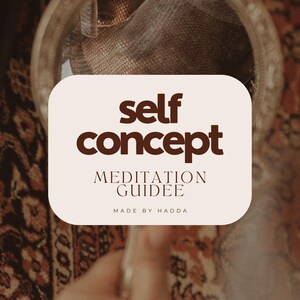 May include: A white rectangle with rounded corners and brown text that reads "self concept MEDITATION GUIDEE MADE BY HADDA". The rectangle is in front of a mirror reflecting a person's face.