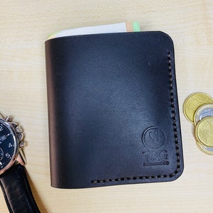 Cartera con compartimento para billetes y tarjetas bancarias