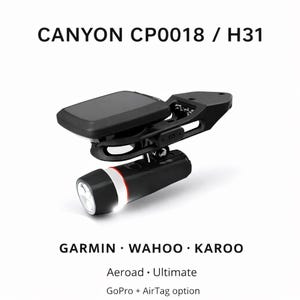 May include: Black bicycle light and computer mount with the text "CANYON CP0018 / H31". The mount is compatible with Garmin, Wahoo, and Karoo devices. Features include Aeroad, Ultimate, and GoPro + AirTag options.