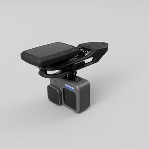 May include: A black action camera mount with a swivel arm and a GoPro camera attached. The mount is designed to be used on a vehicle.