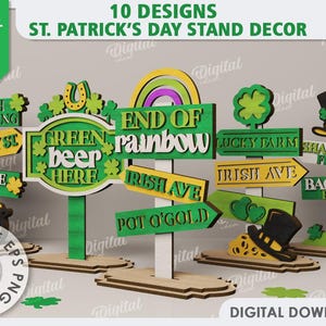 May include: Ten St. Patrick's Day themed signs for a stand-up decor. The signs are made of wood and feature green, yellow, and white colors. The signs have various sayings such as "Green Beer Here", "End of Rainbow", "Lucky Farm", "Irish Ave", "Shamrock Fields", "Bagpipe Blvd", "Irish Blessing", "Lucky St", and "Pot O' Gold".
