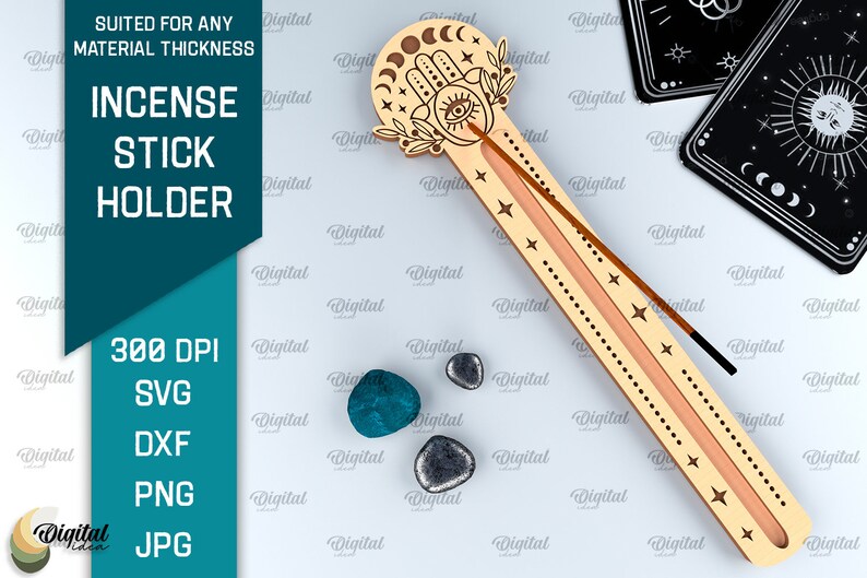 May include: A wooden incense stick holder with a hand and eye design. The holder is decorated with stars and moons. The holder is suitable for any material thickness. 300 DPI SVG, DXF, PNG, JPG.