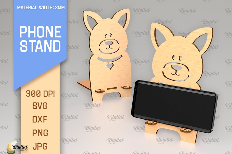May include: A phone stand made of wood, shaped like a cartoon dog. The stand is 3mm thick and is designed to hold a smartphone upright. The stand is available in SVG, DXF, PNG, and JPG formats.