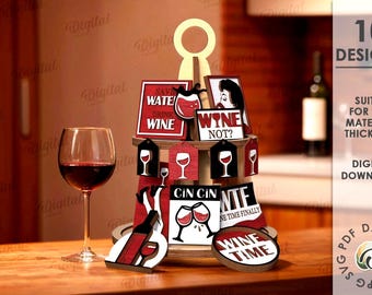 May include: A multi-tiered wooden display with wine-related cutouts and a wine glass. The cutouts display phrases such as "Wine Time" and "Save Water Drink Wine." The display is on a wooden surface, with a glass of red wine.