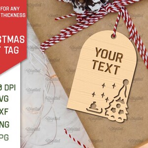 May include: A wooden Christmas gift tag with a cut-out design of a Christmas tree and stars. The tag has the text "YOUR TEXT" at the top.