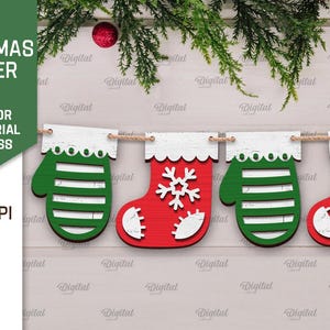 May include: A Christmas banner with red and green mittens and stockings. The banner is made of wood and has a white background. The text "Christmas Banner" is at the top of the image.