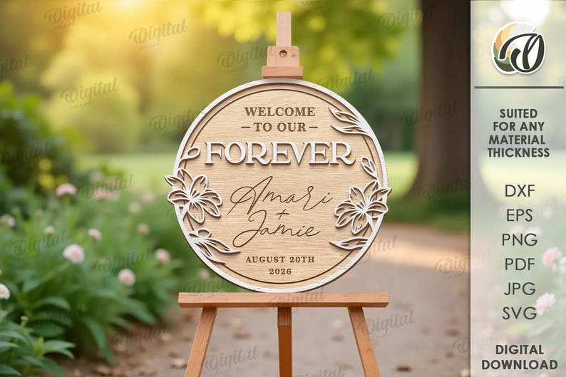 May include: A wooden wedding sign on an easel. The sign is round with the words "WELCOME - TO OUR - FOREVER" and the names "Amari & Jamie" with the date "AUGUST 20TH 2026". The sign is decorated with floral designs.
