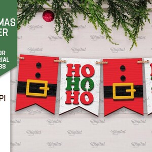 May include: A Christmas banner with red and white pennants. The pennants feature a Santa Claus belt design and the words "Ho Ho Ho" in red and green letters.