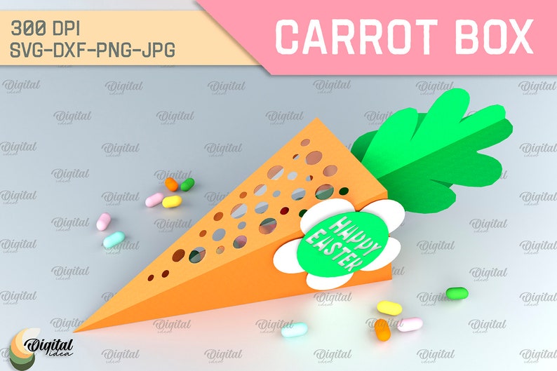 Pode incluir: Uma caixa em forma de cenoura imprim&iacute;vel em 3D com uma parte superior verde frondosa e uma flor branca com um c&iacute;rculo verde que diz "Feliz P&aacute;scoa". A caixa &eacute; projetada para conter pequenas guloseimas ou presentes.