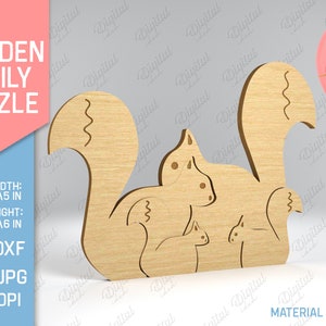 Op de afbeelding: Houten familie puzzel met een eekhoorn, twee baby eekhoorns en een roze ballon met het woord "LOVE" erop. De puzzel is gemaakt van hout en is 127 mm breed en 153 mm hoog. De materiaal dikte is 3 mm.