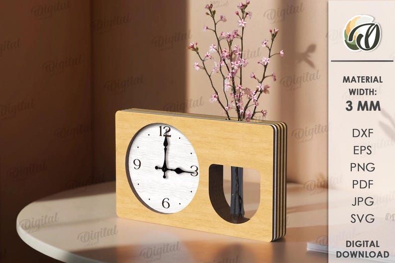 K&ouml;nnte beinhalten: Eine Kombination aus Holz-Uhr und Vase. Das Zifferblatt ist wei&szlig; mit schwarzen Zeigern und Ziffern. Der Vasenbereich enth&auml;lt rosa bl&uuml;hende Zweige. Die Uhr steht auf einem wei&szlig;en Tisch.
