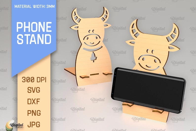 May include: A wooden phone stand with a bull design. The stand is 3 mm thick and is available in SVG, DXF, PNG, and JPG formats. The stand is 300 DPI.