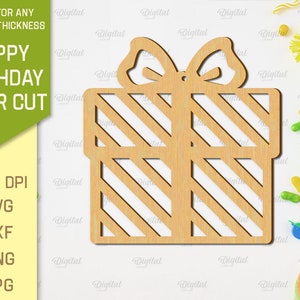May include: A laser cut wooden gift box with a striped pattern and a bow on top. The text "Happy Birthday Laser Cut" is visible in the background.