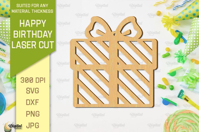 May include: A laser cut wooden gift box with a striped pattern and a bow on top. The text "Happy Birthday Laser Cut" is visible in the background.