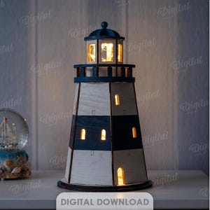 May include: A wooden lighthouse lamp with alternating dark blue and light wood horizontal stripes, featuring a lit lantern room at the top and small arched windows. The structure has a material width of 3 mm and includes digital file formats.