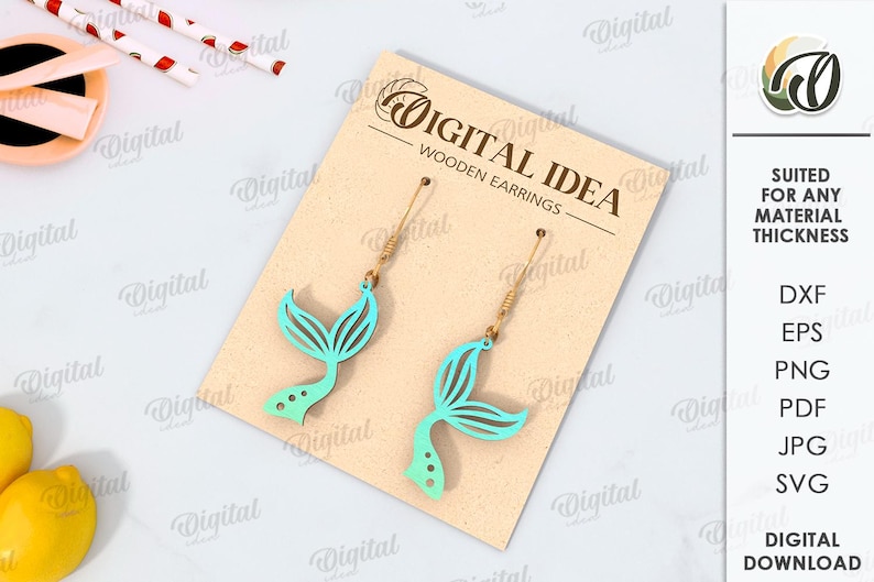 May include: A digital download of mermaid tail earrings. The earrings are made of wood and are available in a variety of colors. The design is suitable for any material thickness. The download includes the following file formats: DXF, EPS, PNG, PDF, JPG, and SVG.