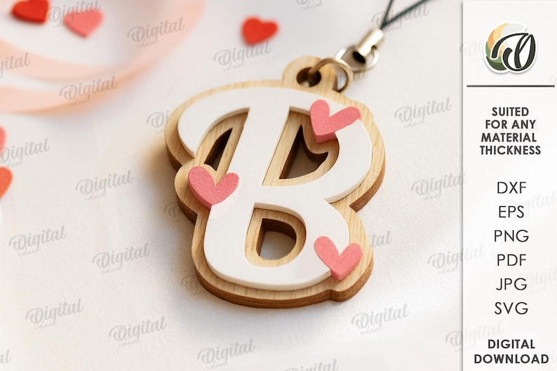 May include: A wooden letter "B" charm with a white overlay and pink heart accents. The charm is attached to a black cord. The image also includes the text "SUITED FOR ANY MATERIAL THICKNESS" and file type options.