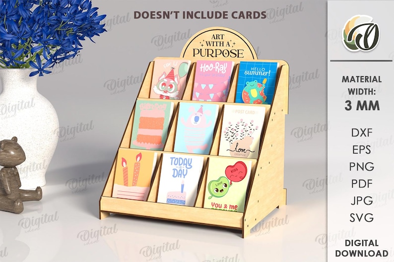 May include: A wooden greeting card display stand with nine slots, holding various colorful cards. The stand has a curved top with the text "ART WITH A PURPOSE". The material width is 3 mm.