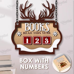 May include: Wooden sign with deer antlers, the text "BOOKS READ THIS YEAR", and numbered boxes. The sign is brown, white, and red, with snowflakes and a small book illustration. The sign is designed for digital download.