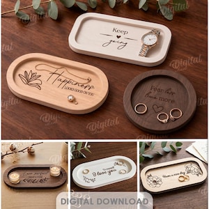 May include: A selection of wooden trays and ring dishes in different shapes and colours. Some trays feature engraved text such as "Happiness looks good on you" and "Keep going." A watch and rings are displayed on some trays. The image also includes the text "10 Designs".